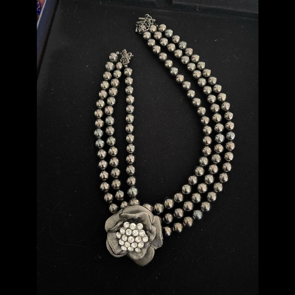 Beautiful black needed with stone flower pendant statement